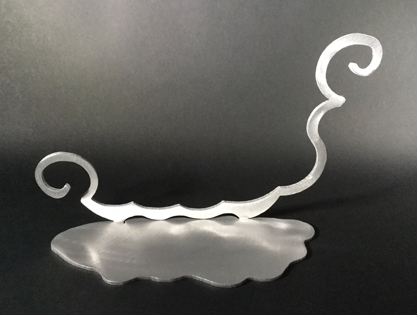 Curly Q Stand